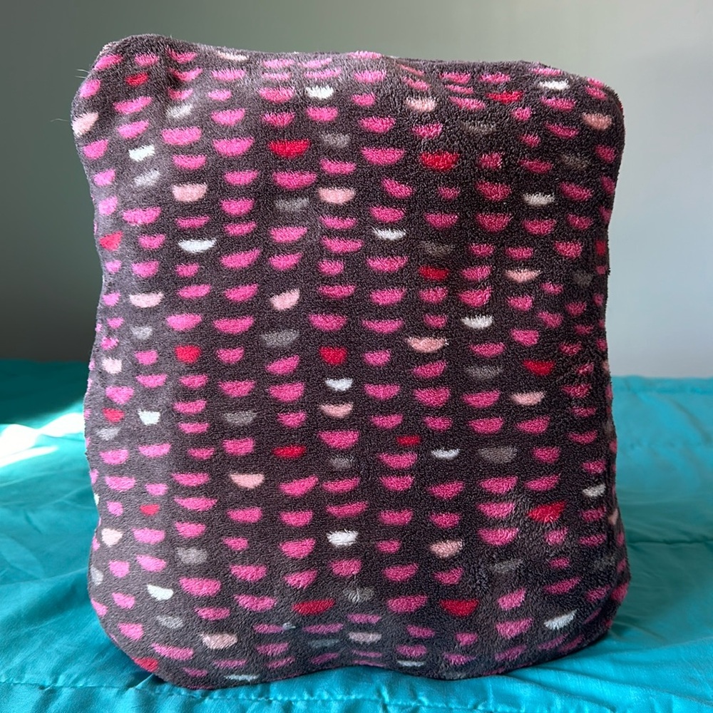 Vera Bradley’s travel pillow throw